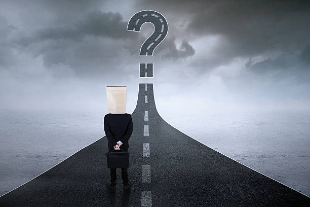 istock Anonymous entrepreneur with question sign at road 478554354