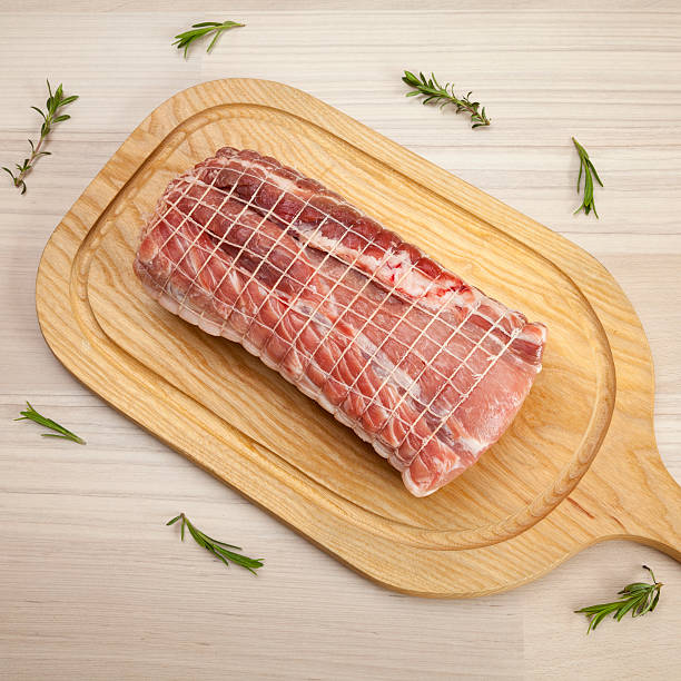 istock Raw rolled pork roast on chopping board 478555994
