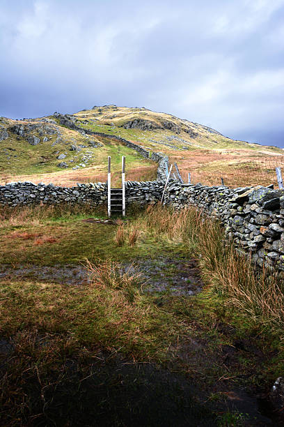 istock Stile on the way up to Red Screes 478556984
