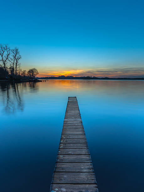 istock Sunset over Wooden Jetty in Groningen, Netherlands 478560778