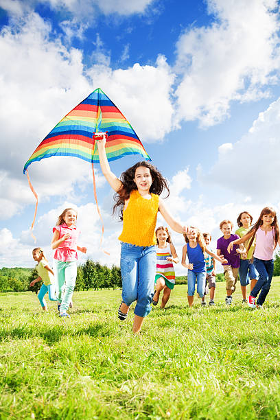 istock Large group of kids running 478561875