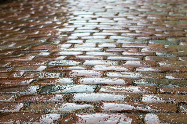 istock Abstract rough texture of wet block pavement 478566196