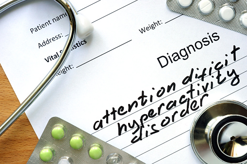 Diagnosis Attention deficit hyperactivity disorder and tablets. Medicine concept.
