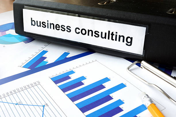 istock Folder with the label business consulting and charts 478566952