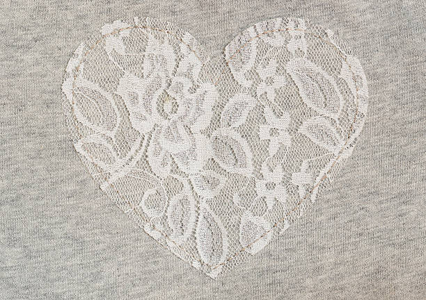 istock Gray jersey fabric with lace heart 478570636