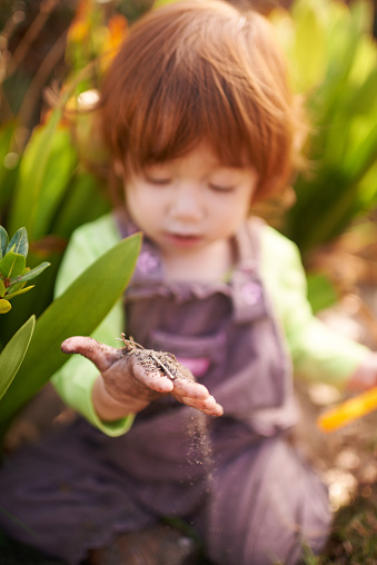 Shot of an adorable little girl playing in the gardenhttp://195.154.178.81/DATA/i_collage/pu/shoots/805004.jpg