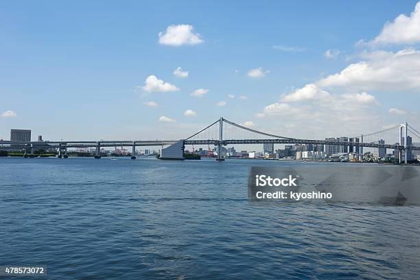 View From Tokyo Bay Against Bridge And Urban Skyline Stock Photo - Download Image Now