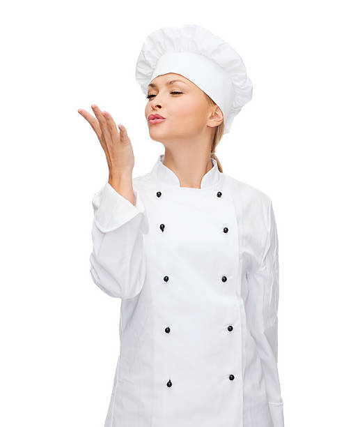 istock smiling female chef showing delicious sign 478576700