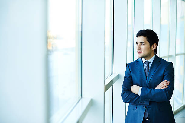 istock Contemplating Asian businessman 478577531