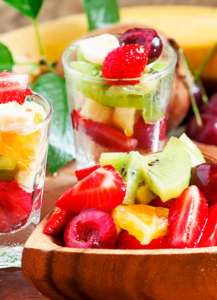 istock Dietary mixed fruit salad with fruit and berries 478578428