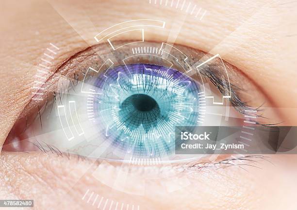 Closeup Of Womans Blue Eye High Technologies In The Futuristi Stock Photo - Download Image Now