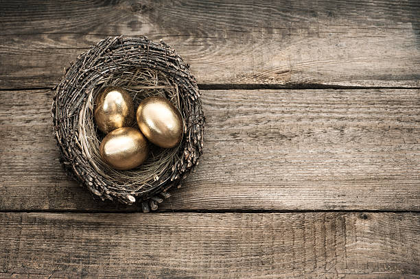 istock golden easter eggs on wooden background 478593889