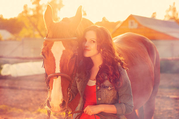 istock Young woman with her horse 478594106