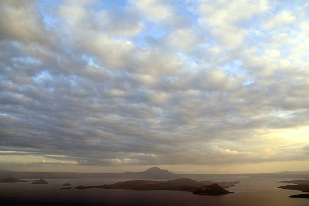Cloudscape over the stunning lake Taal from Tagaytay, a village located on the huge caldera, who forms the lake. The large volcanic caldera was formed by very large eruptions between 500,000 and 100,000 years ago.