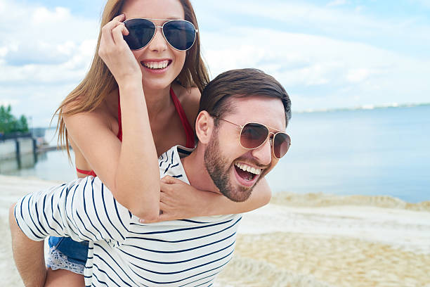 istock Playful lovers on vacation 478597354