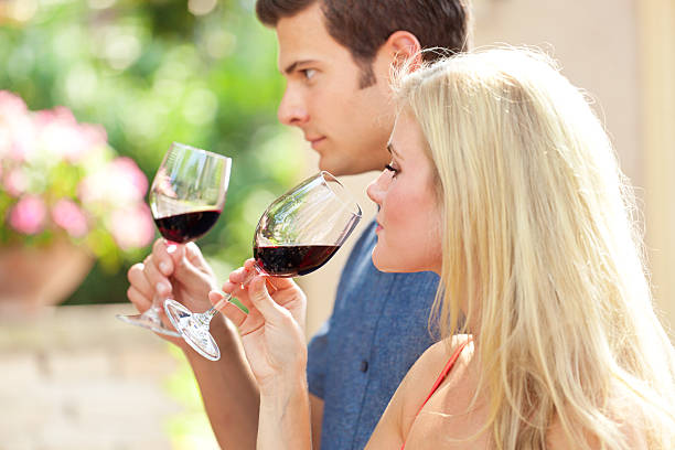 istock Couple Winetasting Drinking, Sipping, Tasting Red Wine at Winery 478598978