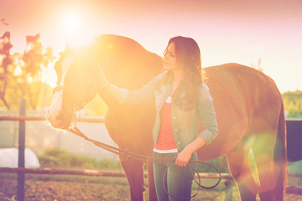 istock Young woman with her horse 478602706