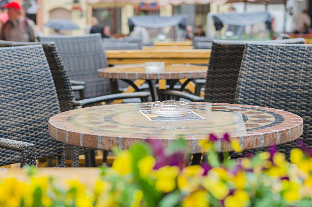 istock Empty outdoor cafe terrace on rainy day 478602928