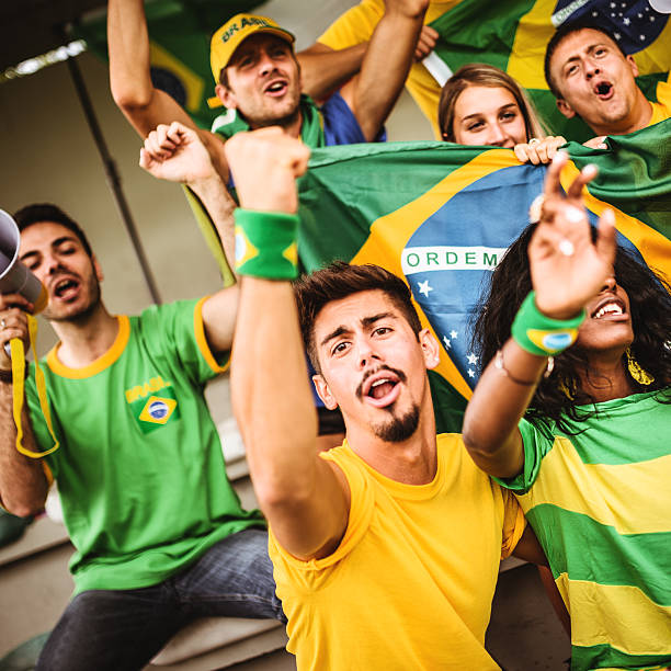 istock Group of brazilian supporters at stadium 478602972
