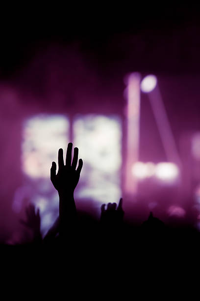 istock christian music concert with raised hand 478604170