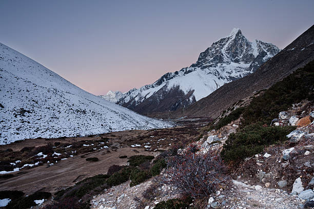Taboche peak at sunset stock photo