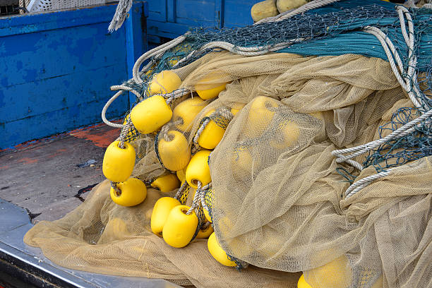 istock Fishing net and yellow buoys 478609550