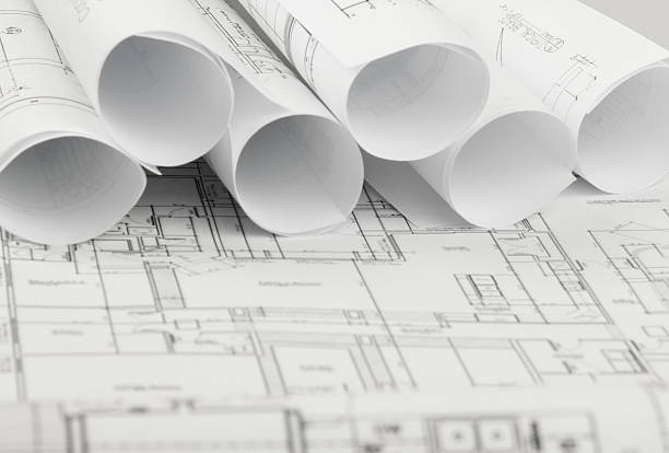 istock rolls of architecture blueprints and house plans 478609906