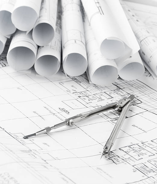 istock rolls of architecture blueprints and house plans 478609920