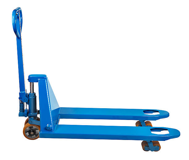 Warehouse equipment, blue Used Pallet Truck isolated on white background Storage equipment, blue hydraulic forklift, palletiser, side view, isolated on white background, saved path of isolation. pallet jack handle stock pictures, royalty-free photos & images