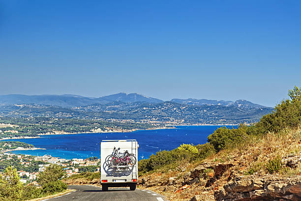 istock Caravan on the road at the mediterranean shore 478617646