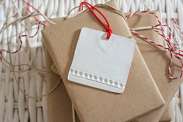 istock gift box wrapped in recycled paper with label 478617827