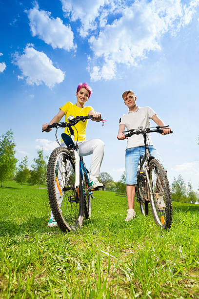 istock Man and woman on bikes 478618809