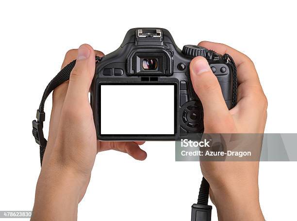 Dslr Camera In Hand Isolated Stock Photo - Download Image Now - Camera - Photographic Equipment, Photographing, Cut Out