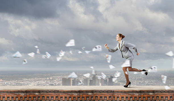 istock Running businesswoman 478625323