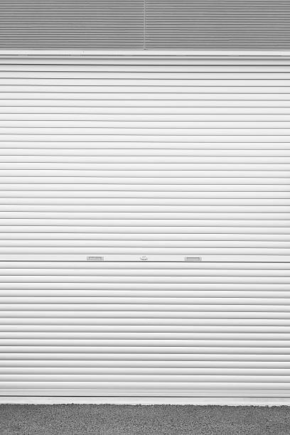 istock White metal roller door shutter background and texture 478626966