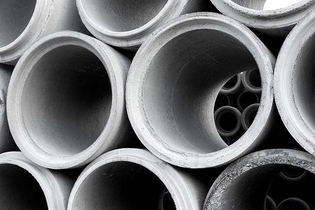 pile of concrete pipes stock photo