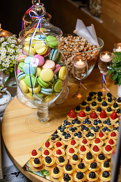 istock Pastries, macaroons and popcorn in candy bar 478627684