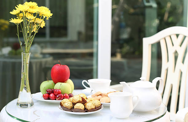 istock Tea time with chocolate and cookies or biscuit and fruit 478634738
