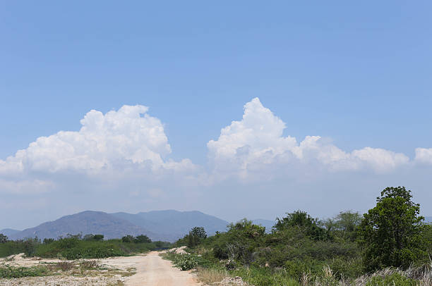 istock Road to the mountain and cloud scape sky background 478634778