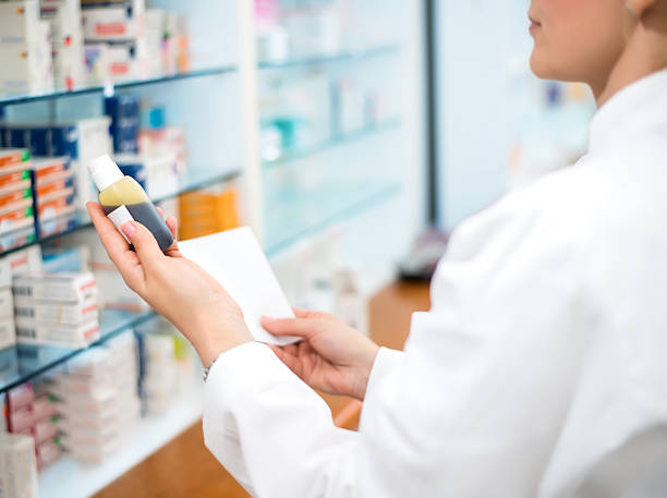 istock Female pharmacist in pharmacy with medicament 478634806