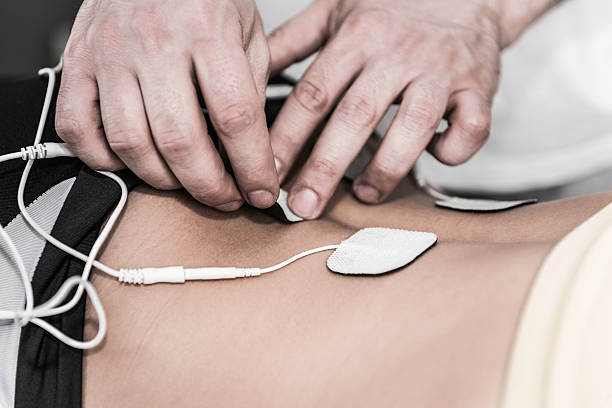 istock TENS treatment in physical therapy 478635254