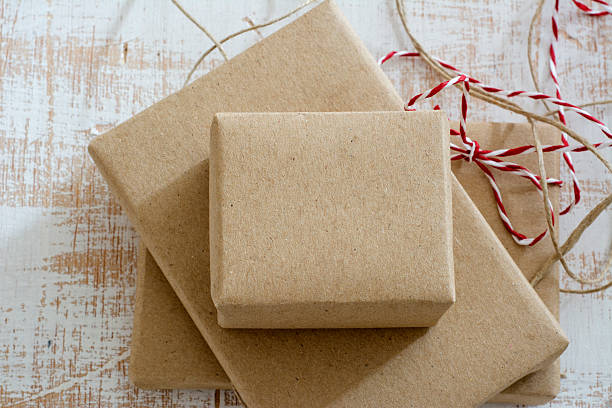 istock gift box wrapped in recycled paper with ribbon bow 478635519
