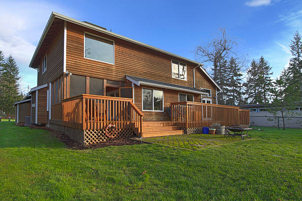 istock Back of the cedar house with deck 478638509
