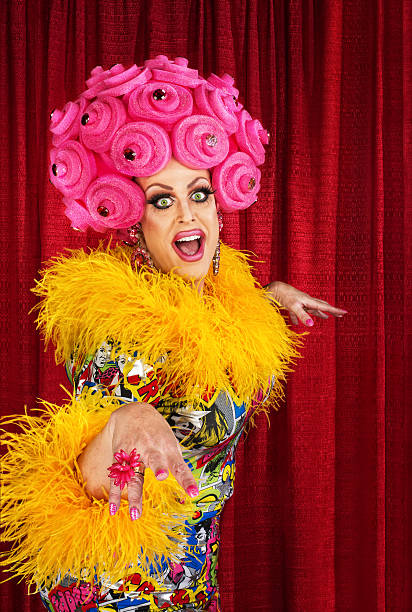 Happy Drag Queen Happy dancing drag queen in pink foam wig diva human role stock pictures, royalty-free photos & images