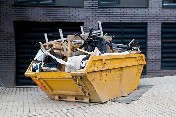 Industrial Skip, Overflowing Yellow industrial skip full of disused office equipment industrial garbage bin photos stock pictures, royalty-free photos & images