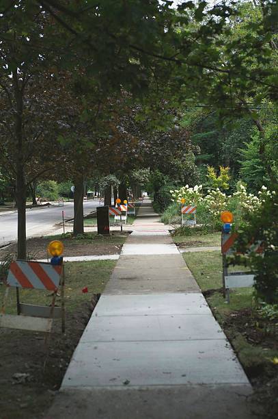 Sidewalk with Construction Signs stock photo