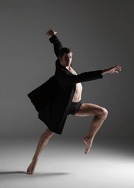 istock The young attractive modern ballet dancer on white background 478642722