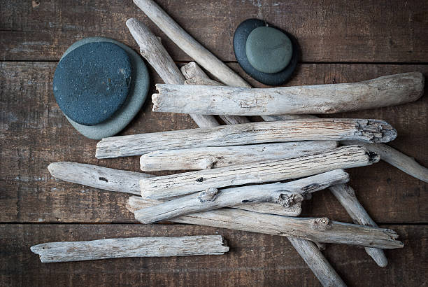 istock Driftwood & Beach Stones Wood Background 478643252