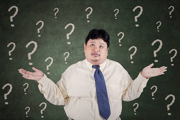 istock Confused overweight businessman 478643770