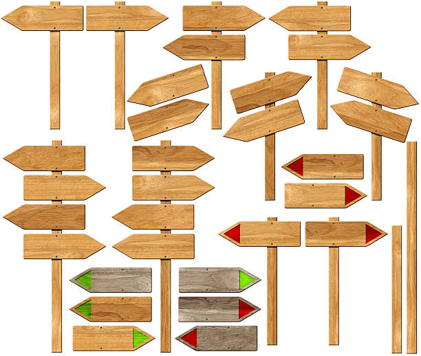 Set of Directional Wooden Signs with Pole Collection of wooden signs with directional arrow and pole. Isolated on white background hiking sign stock pictures, royalty-free photos & images